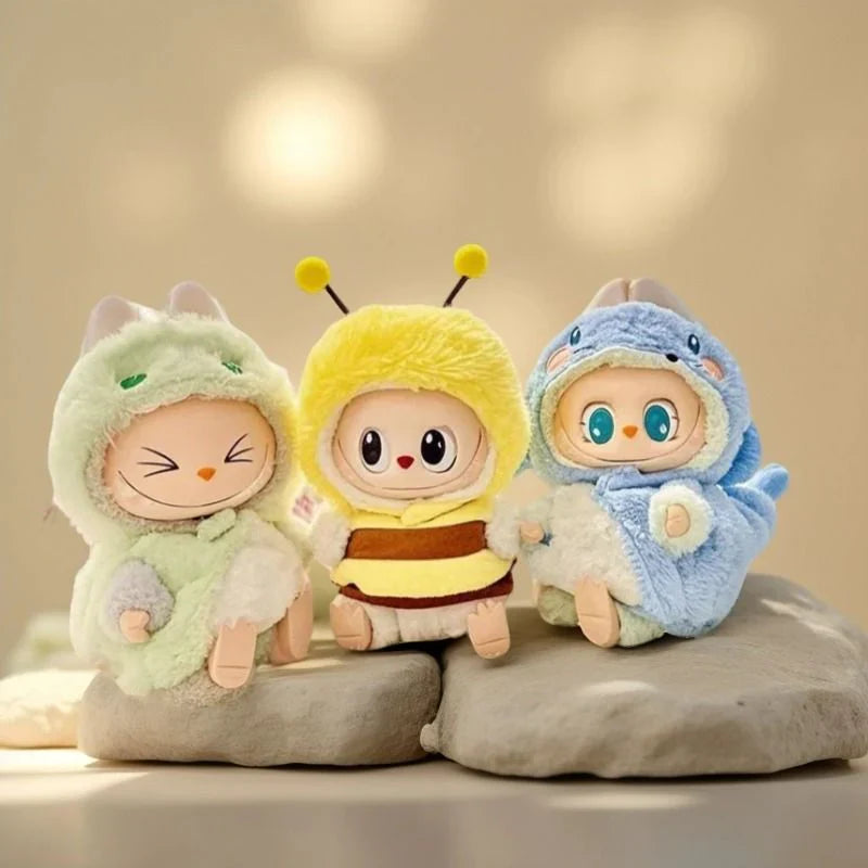 A group shot of several Labubu dolls dressed in a variety of colorful and stylish custom outfits