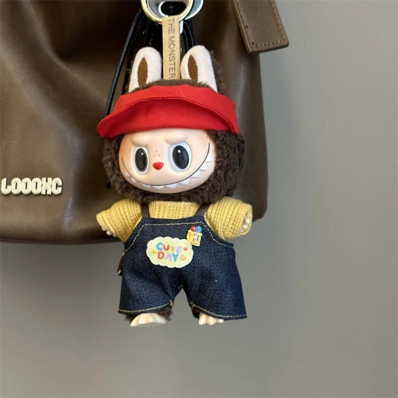 Labubu doll in a glamorous black and gold outfit inspired by celebrity fashion, part of the Labubu doll clothes collection.