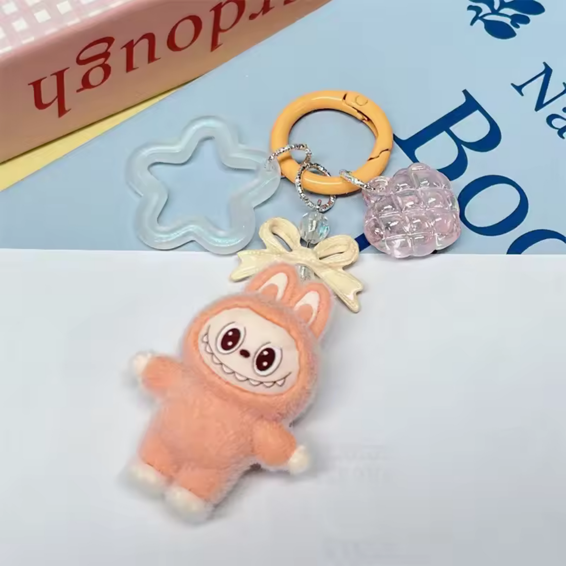 Labubu Orange Plush Keychain paired with Labubu doll clothes and Labubu outfits