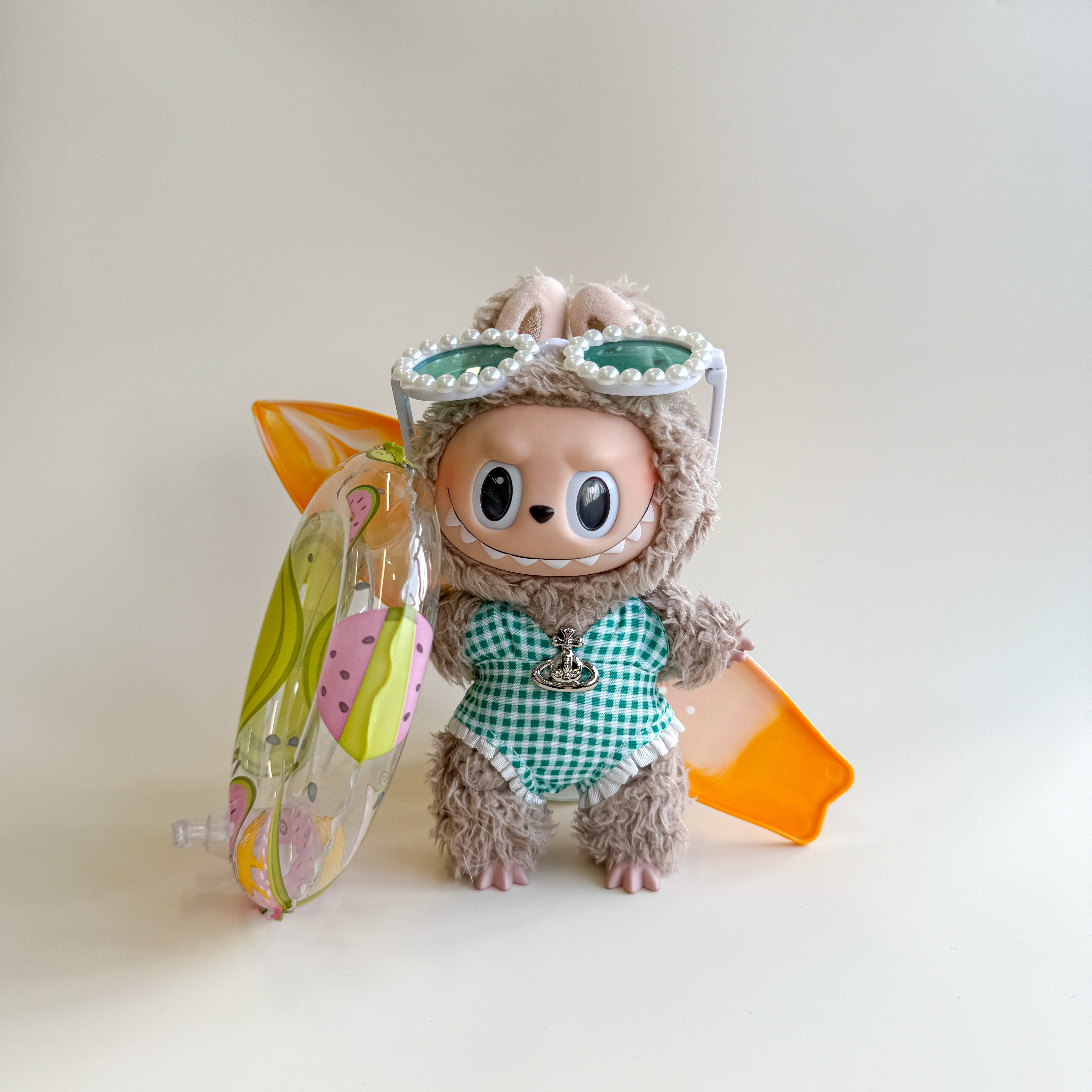 Front view of Labubu doll clothes with bikini and sunglasses