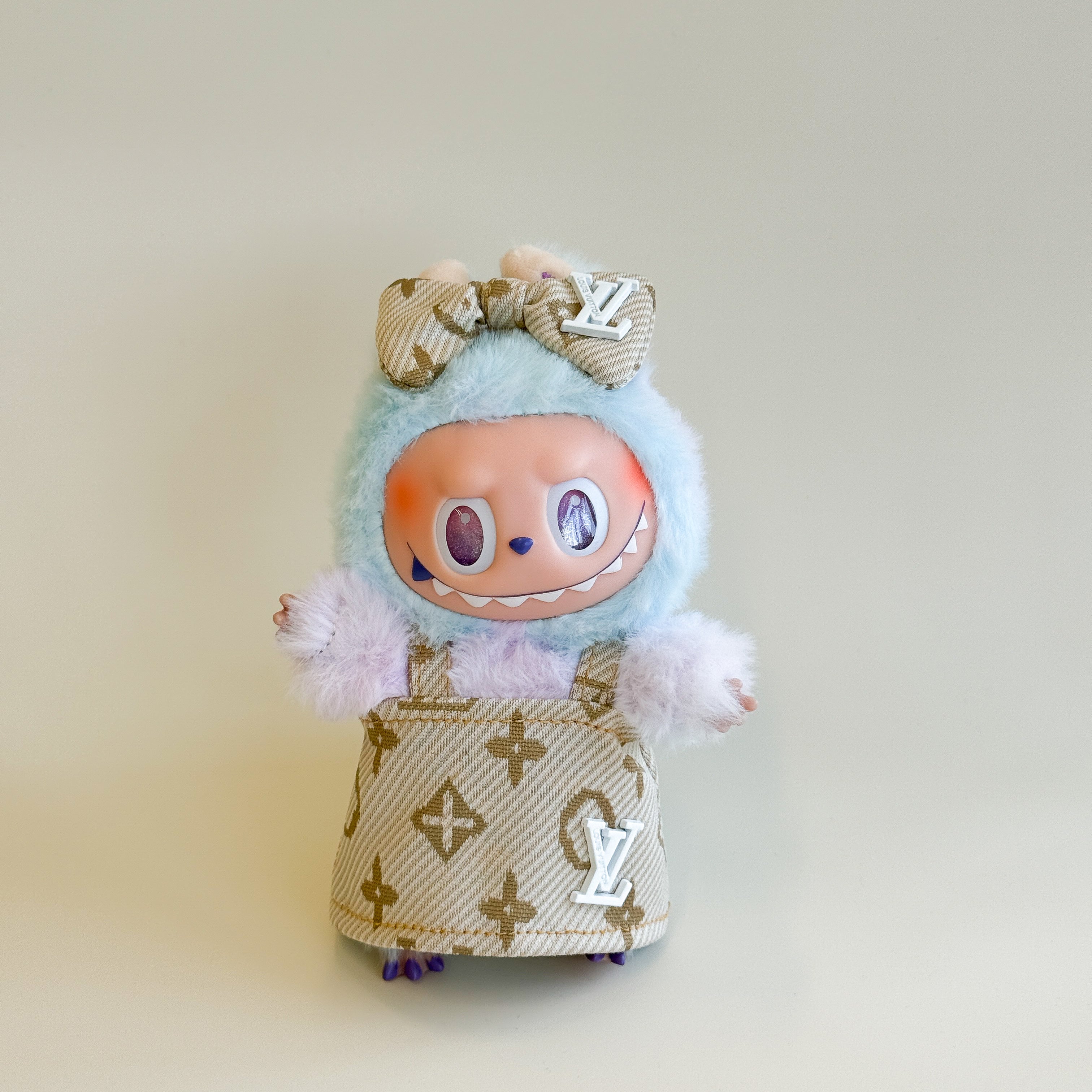 Side view of Labubu doll clothes Luxury Fashion Set with L.V.