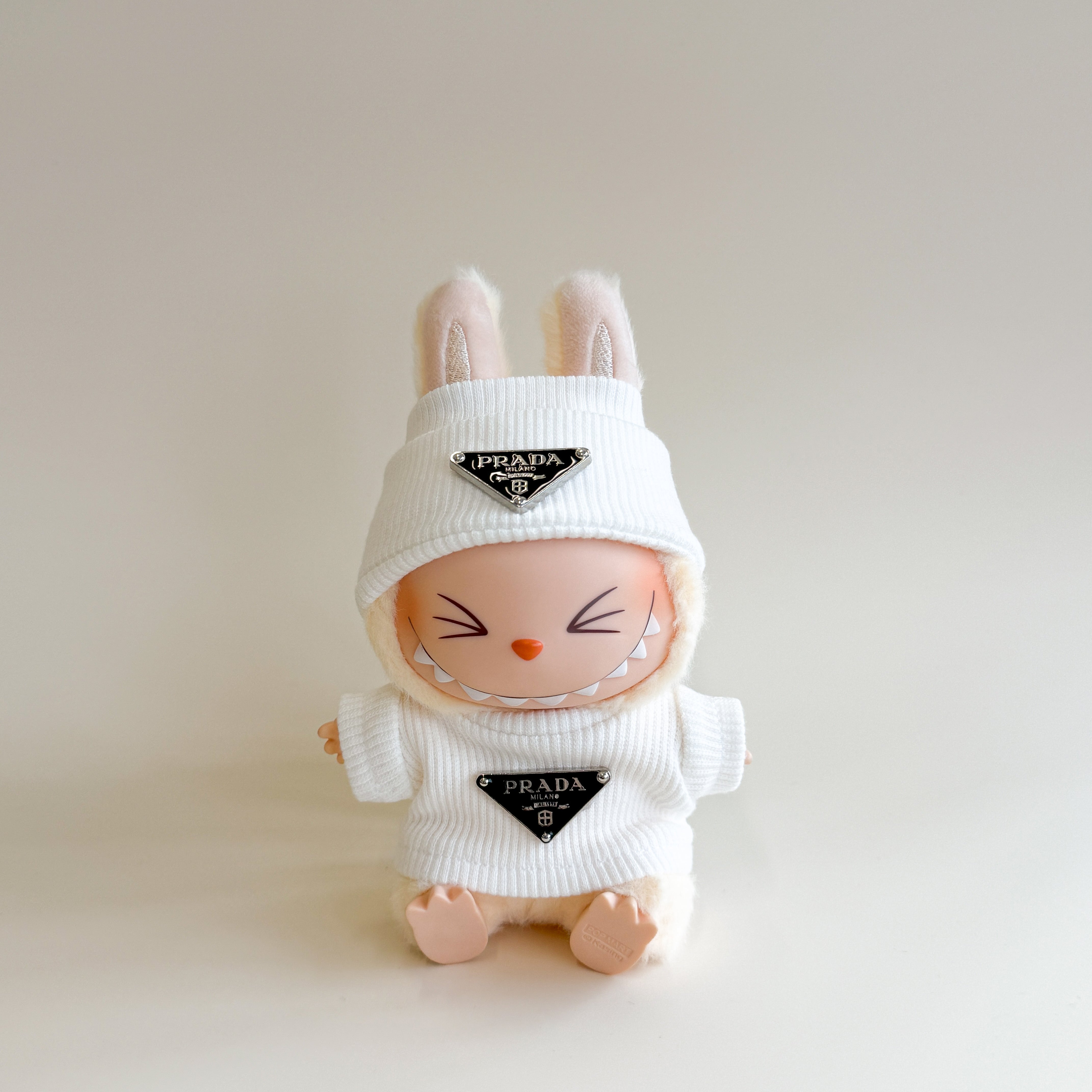 Side view of Labubu doll clothes Luxury Ribbed Set showing texture and logo