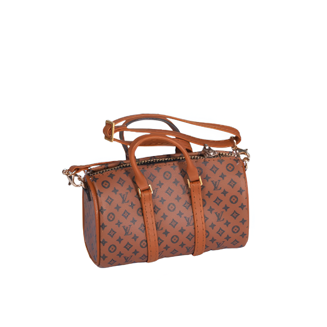 Side profile showing details of Labubu doll clothes miniature Speedy handbag
