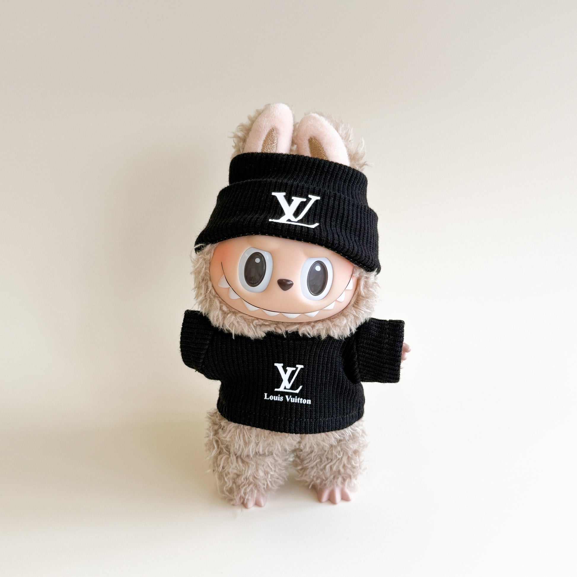 Side angle of classic monogram winter Labubu outfit
