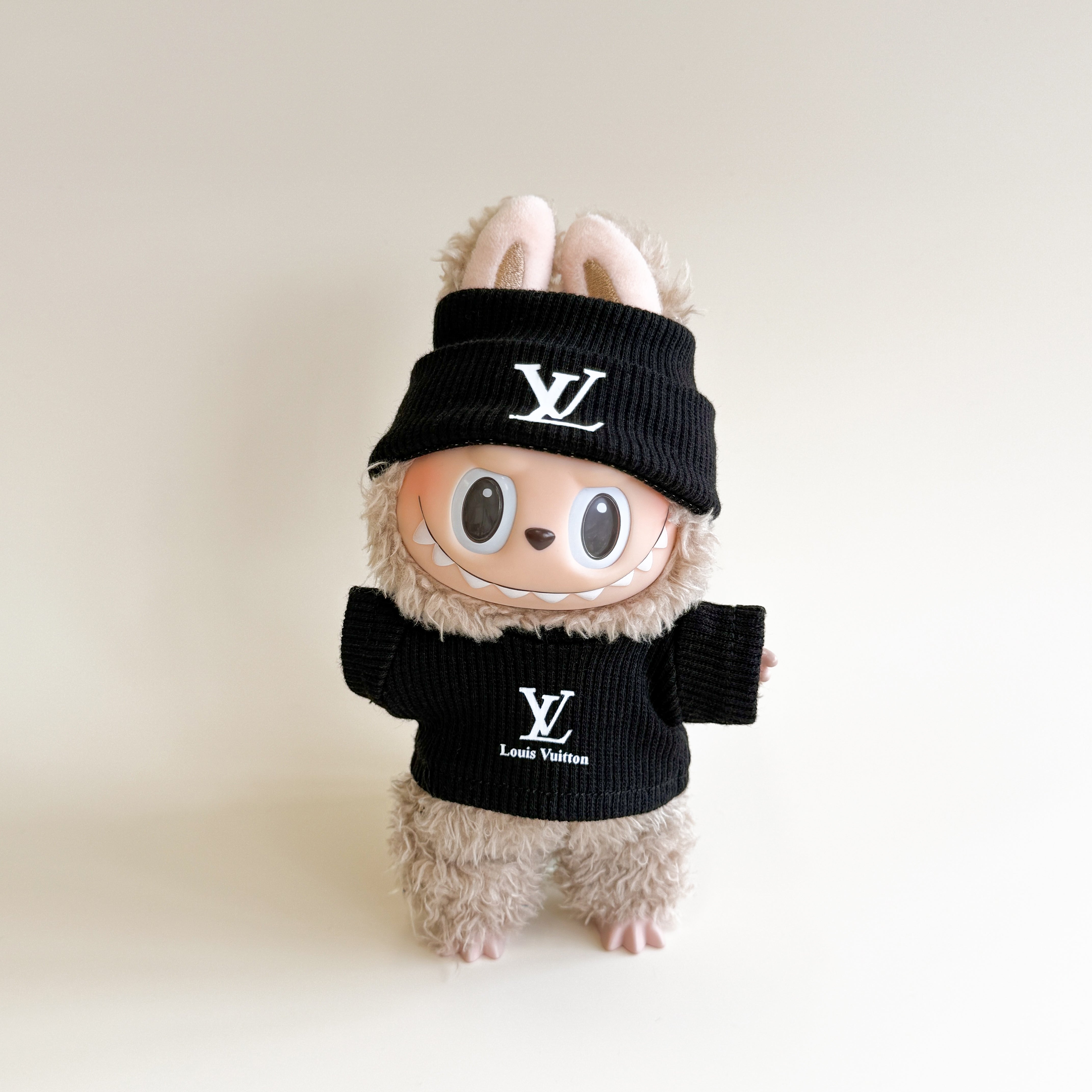 Side angle of classic monogram winter Labubu outfit