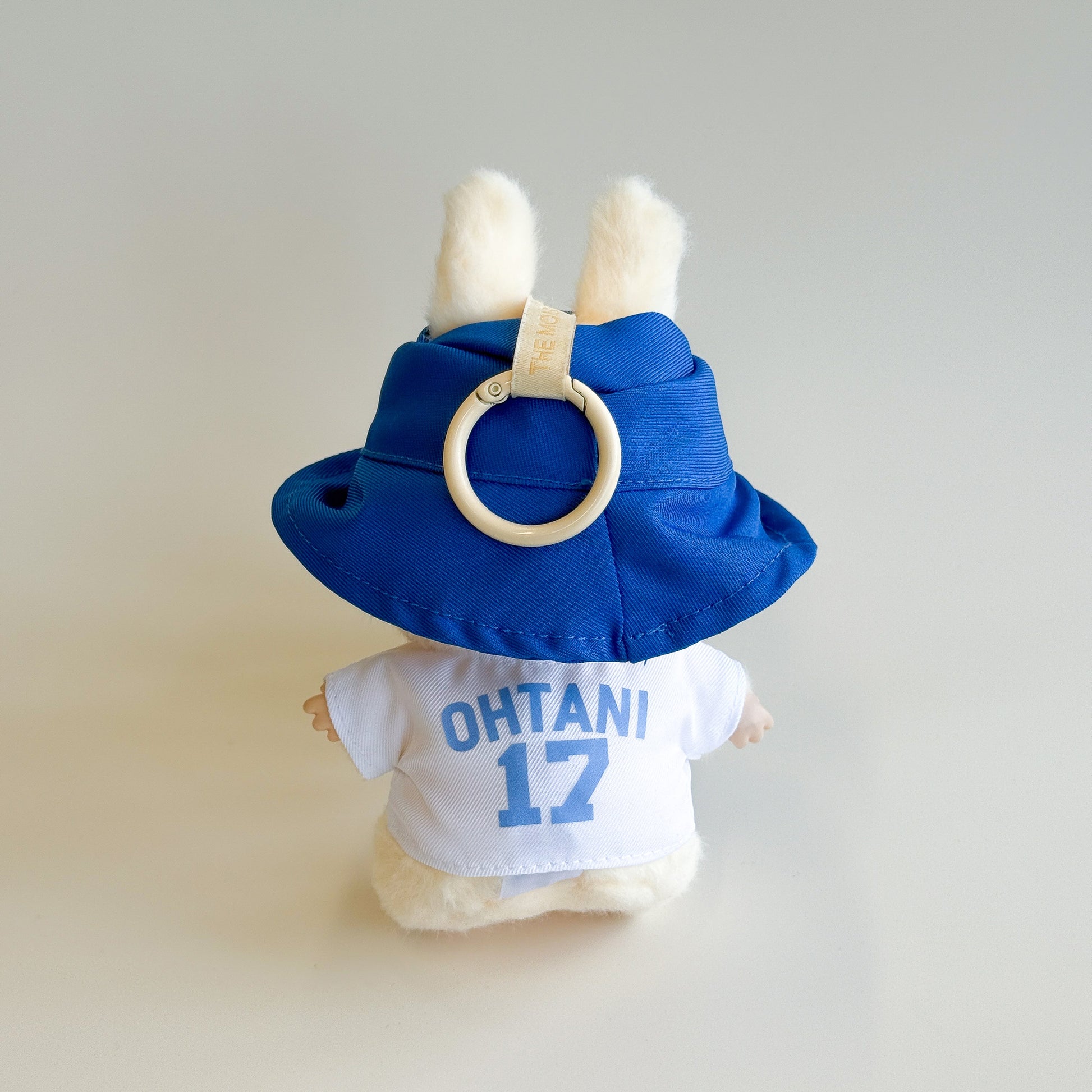 Flatlay of Ohtani inspired baseball set for Labubu