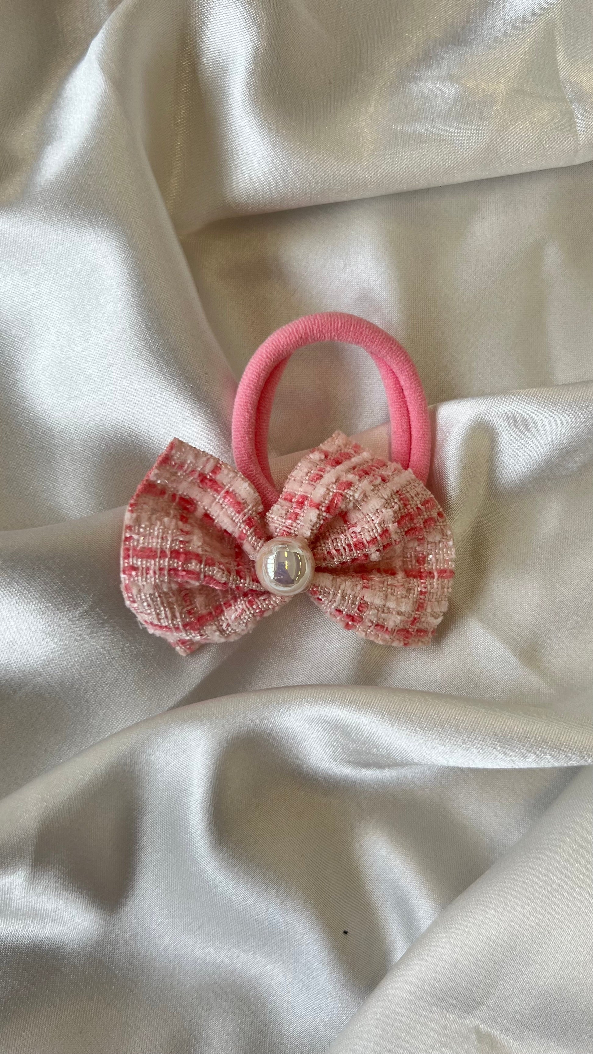 Matching tweed hair bow with pearl accent
