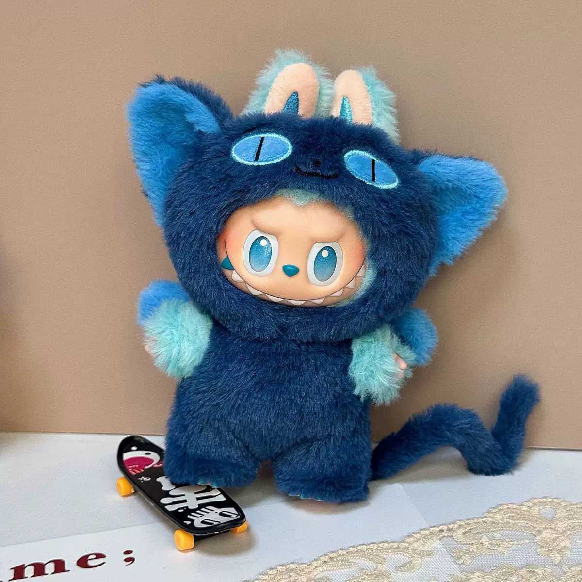 Labubu doll clothes featuring purple fuzzy animal hoodie