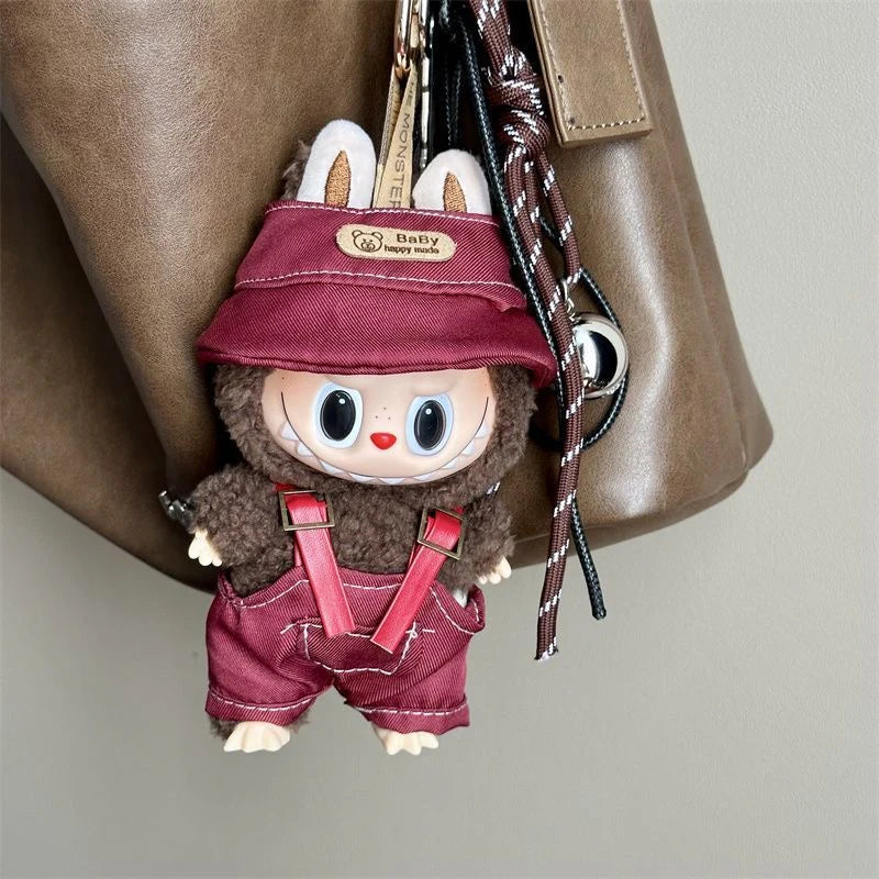 Side view of Labubu doll red overalls and cap