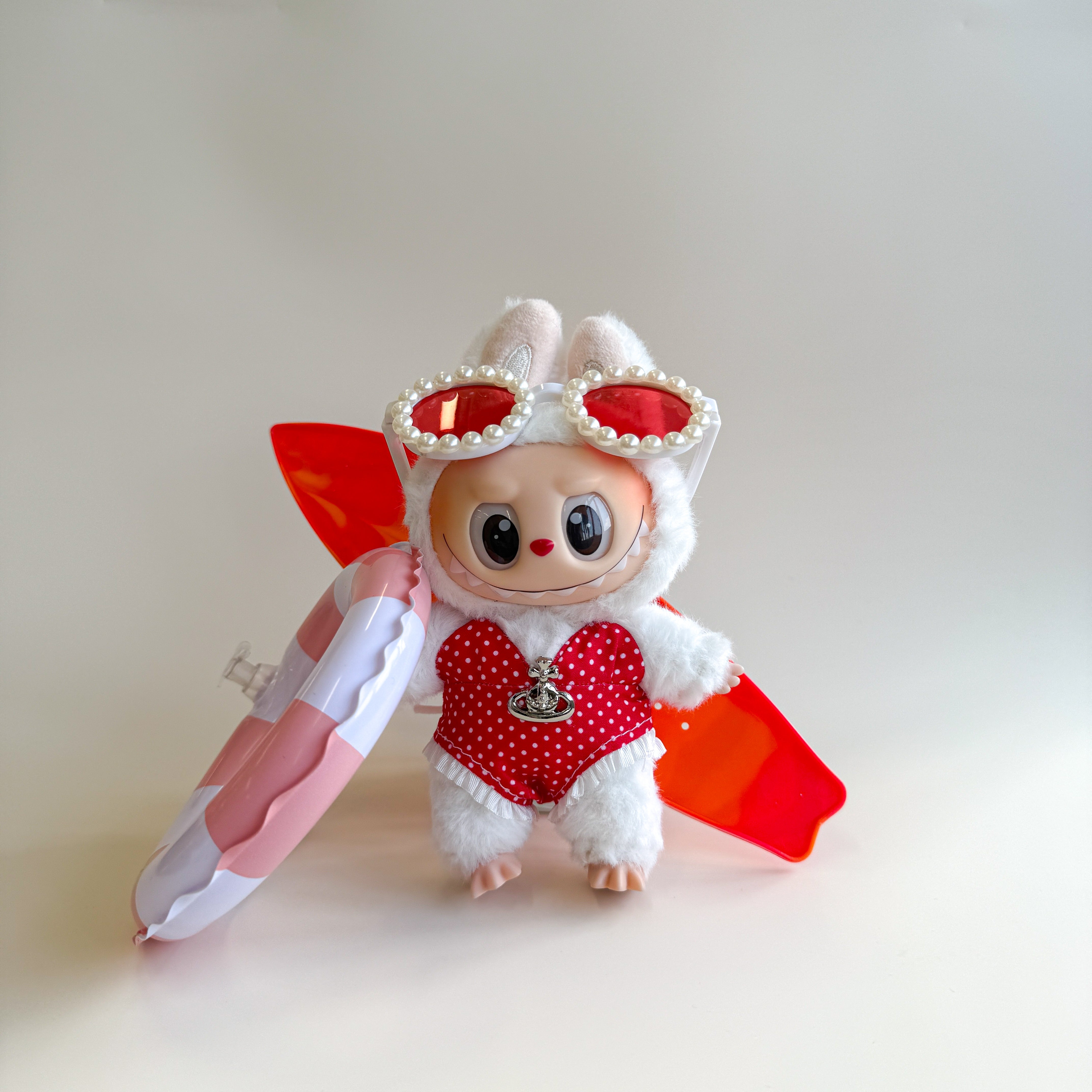 Front view of red summer Labubu doll clothes Vivienne W style