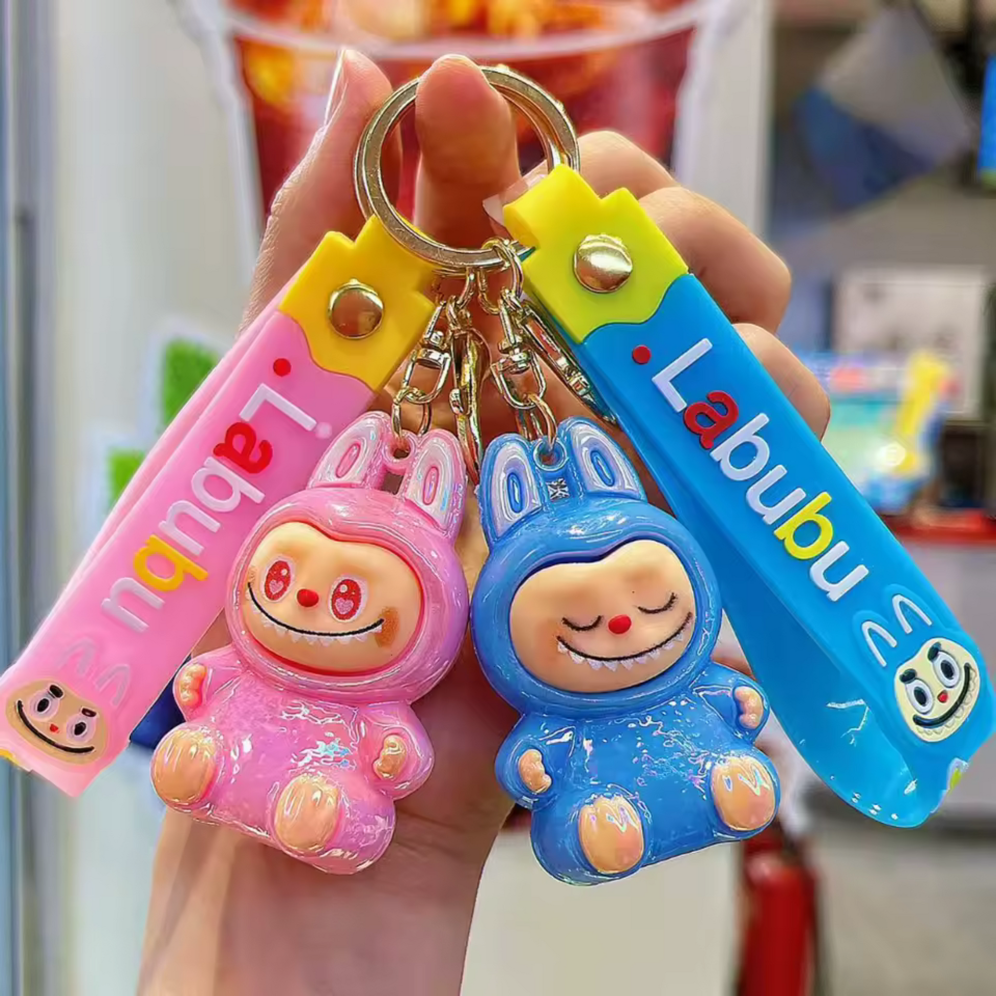 Blue Shiny Sitting Labubu Keychain paired with Labubu doll clothes and Labubu outfits