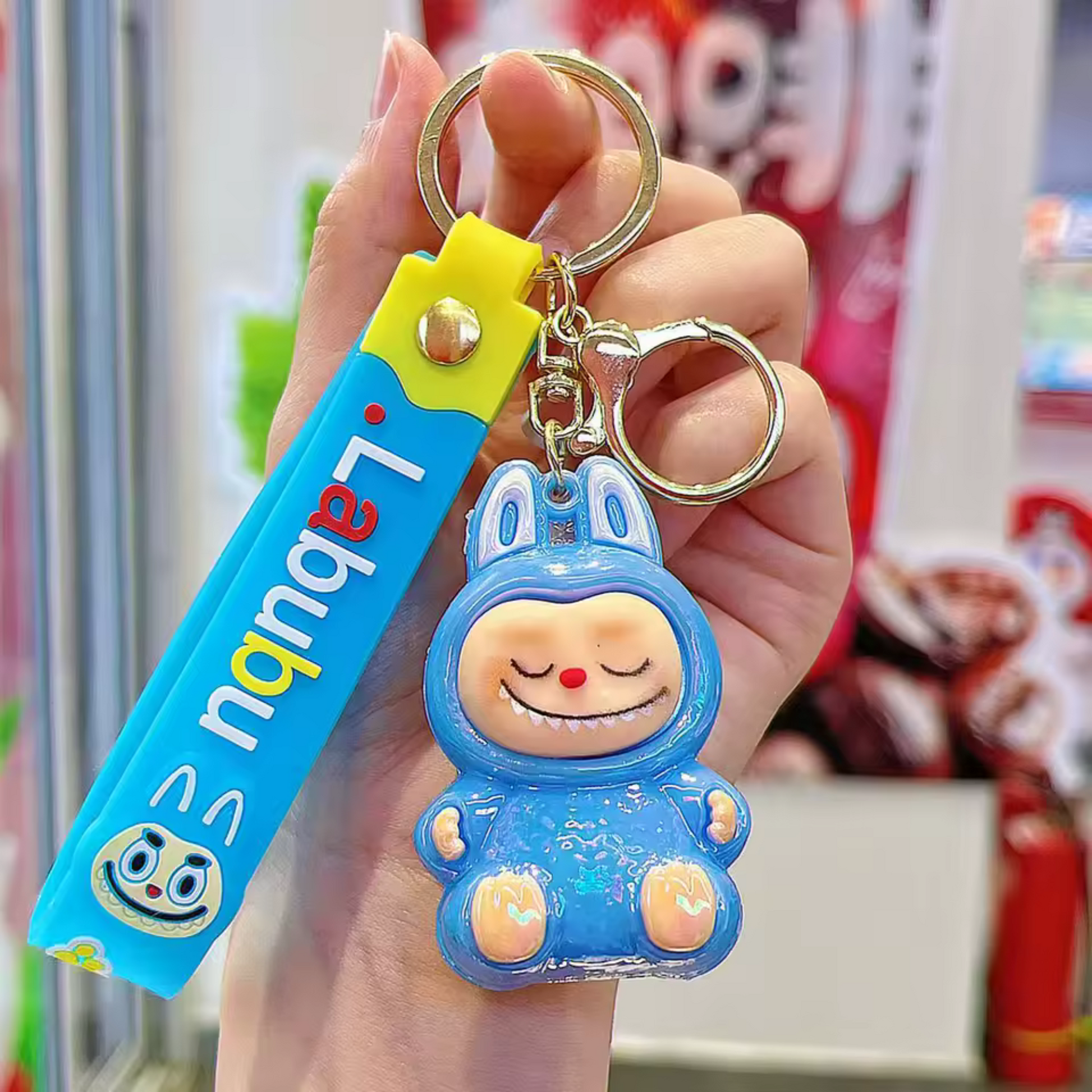 Side view of Blue Shiny Sitting Labubu Keychain, ideal for Labubu clothing set for collectors